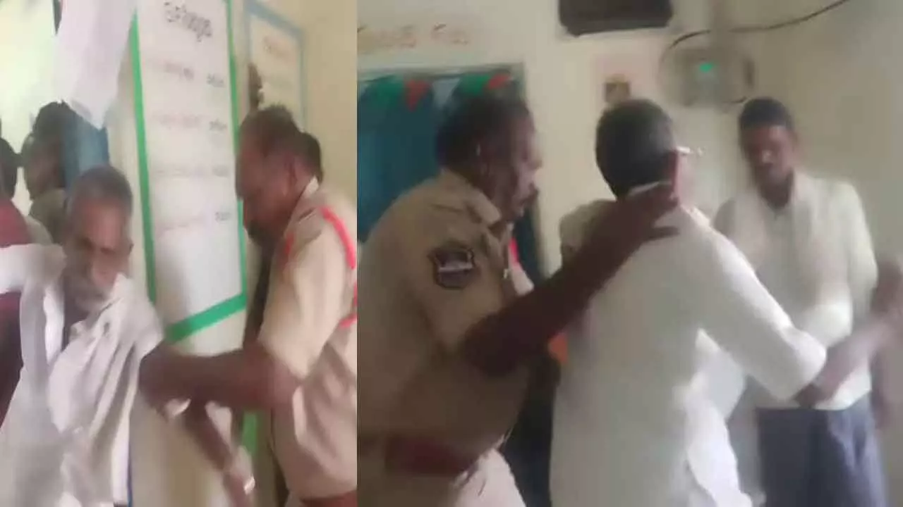 వృద్ధ రైతుపై పోలీసుల దౌర్జన్యం… వృద్ధ రైతుపై పోలీసుల దౌర్జన్యం…